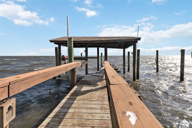 view of dock with a water view