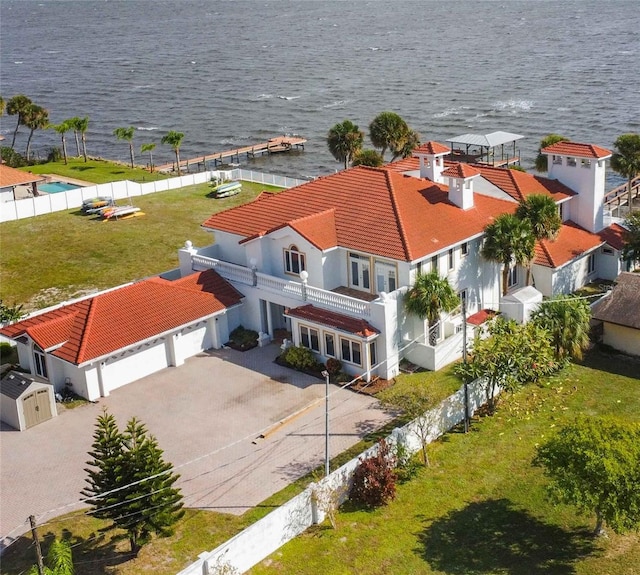 birds eye view of property featuring a water view