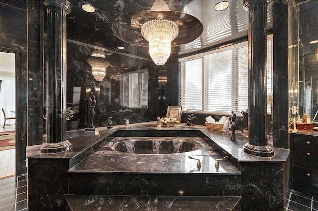 bathroom with a relaxing tiled tub