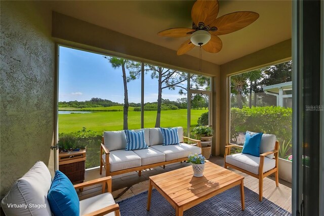633 Tremont Greens Ln Unit 16, Sun City Center, FL 33573 - sunroom featuring outdoor lounge area, golf course view, a water view, and ceiling fan