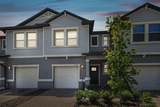 view of property featuring a garage