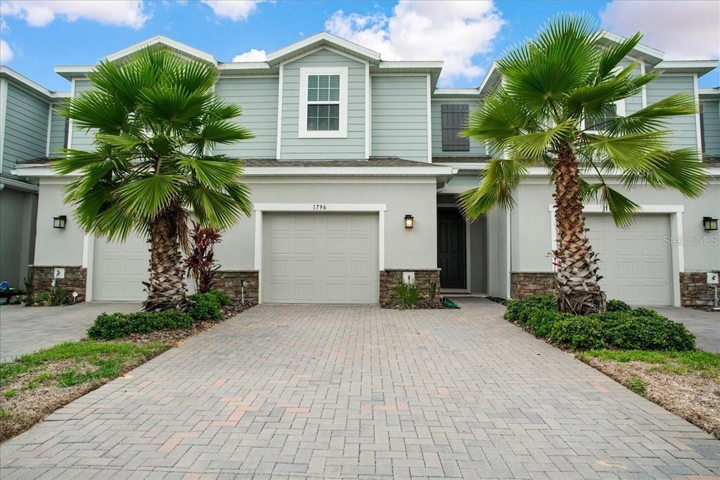 view of front of property featuring a garage