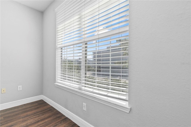 interior details featuring hardwood / wood-style flooring