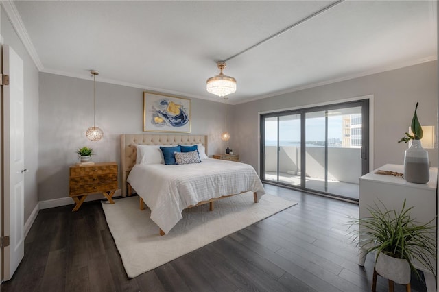 bedroom featuring crown molding, dark hardwood / wood-style floors, and access to outside