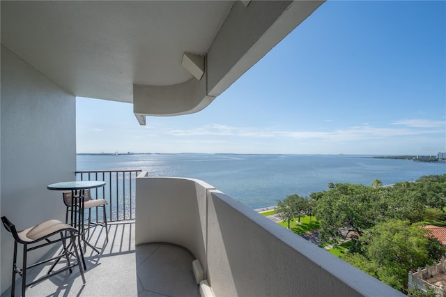 balcony featuring a water view