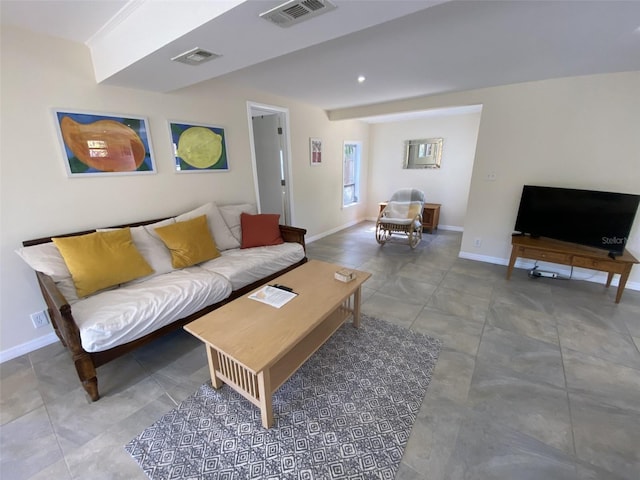 living room featuring tile patterned flooring