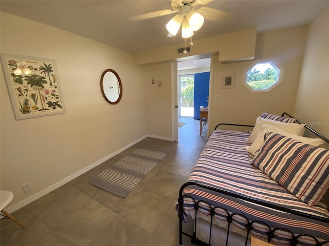 bedroom featuring tile patterned flooring and ceiling fan