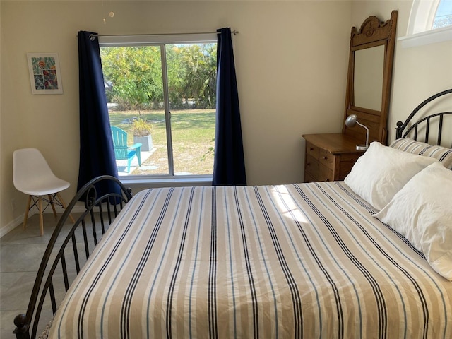 bedroom featuring tile patterned flooring