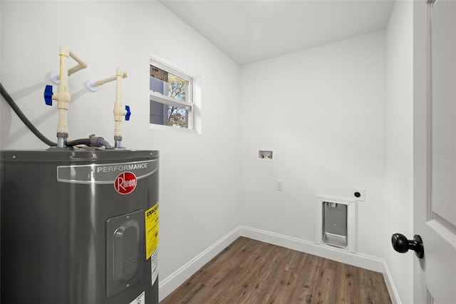 utility room featuring electric water heater