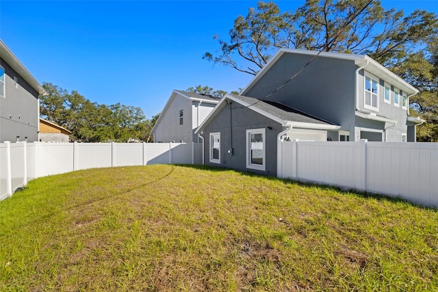 exterior space with a lawn