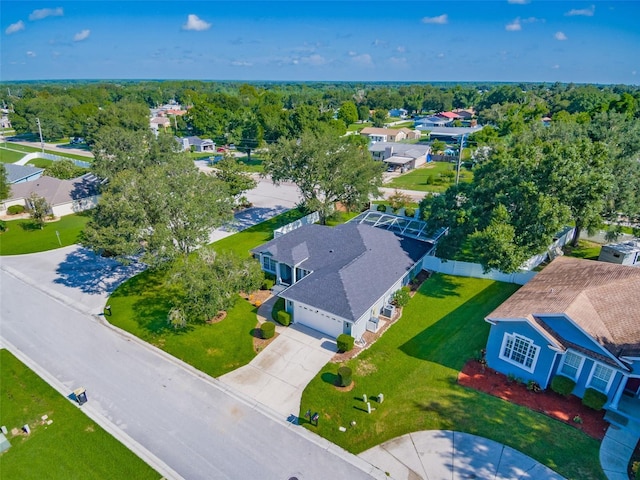 birds eye view of property with a residential view