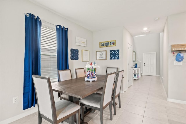 dining room with light tile patterned floors