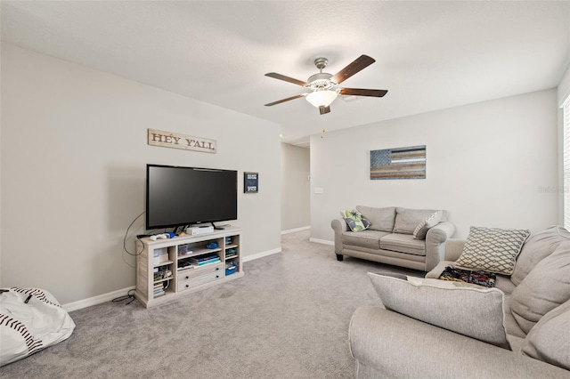 living room featuring carpet flooring and ceiling fan