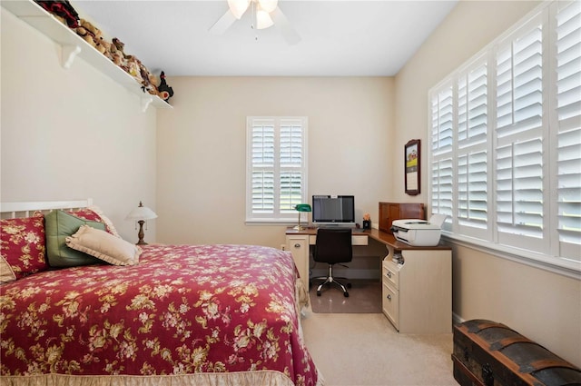 bedroom featuring carpet and a ceiling fan