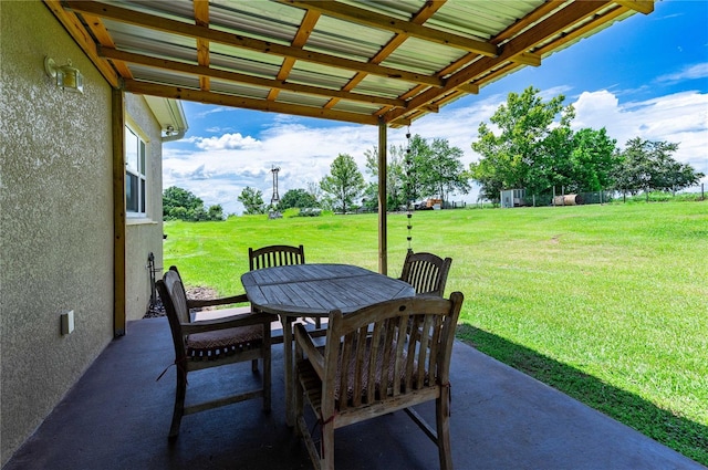 view of patio with outdoor dining area