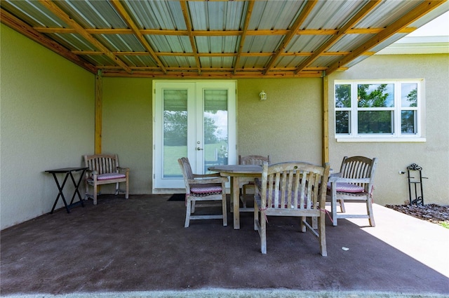 view of patio featuring french doors and outdoor dining space
