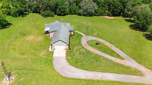 birds eye view of property featuring a rural view