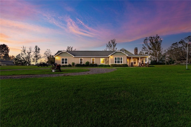 view of front of house with a lawn