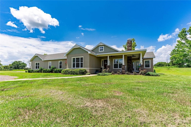 craftsman inspired home featuring a front yard