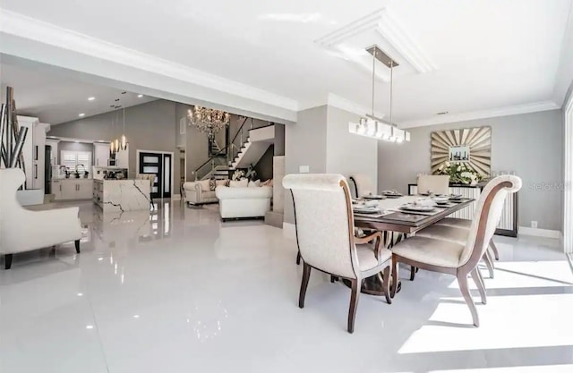 dining area featuring a notable chandelier and crown molding