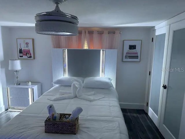 bedroom featuring dark hardwood / wood-style floors