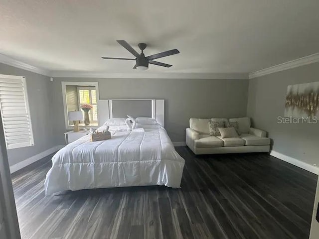 bedroom featuring ceiling fan, crown molding, and dark wood-type flooring