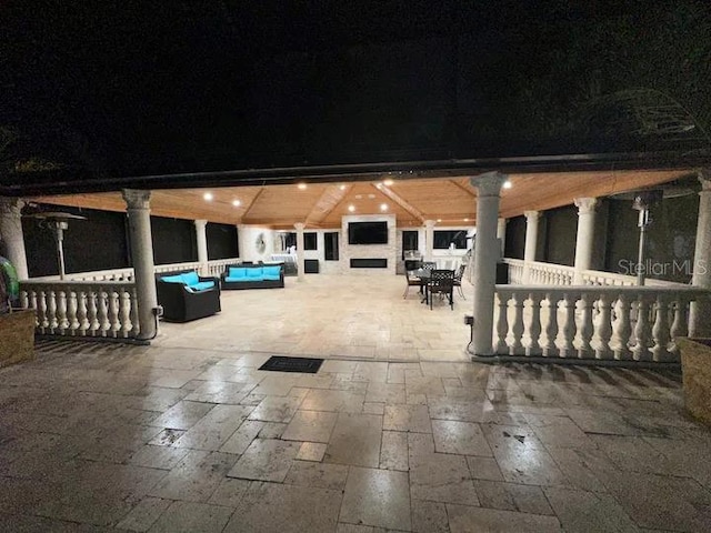 patio at twilight with an outdoor hangout area