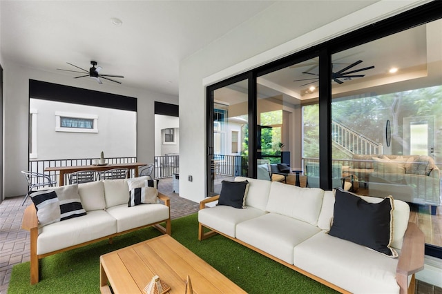 living room featuring ceiling fan