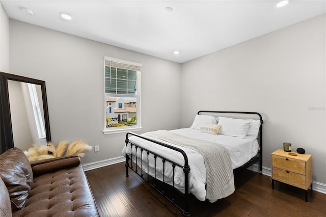 bedroom featuring dark hardwood / wood-style floors