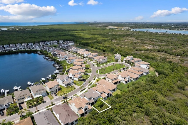 drone / aerial view featuring a water view