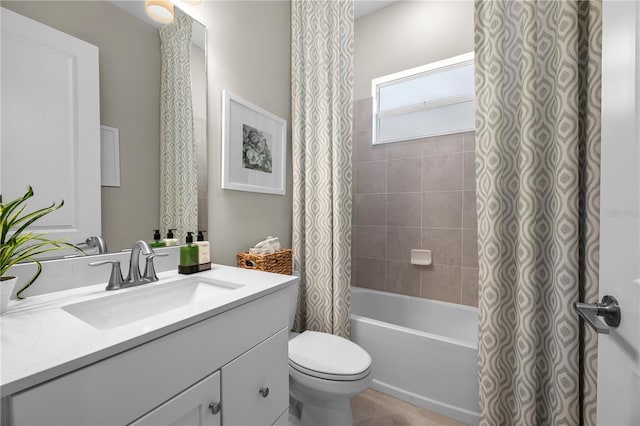 full bathroom with vanity, shower / bath combination with curtain, and toilet