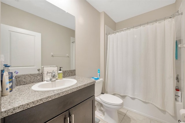 full bathroom with shower / bath combination with curtain, vanity, tile patterned floors, and toilet