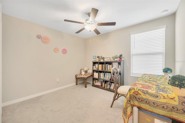 carpeted bedroom featuring multiple windows and ceiling fan