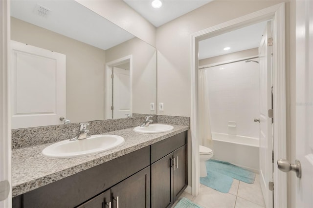 full bathroom featuring vanity, shower / bath combo, tile patterned floors, and toilet