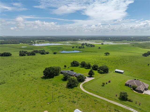 aerial view featuring a water view and a rural view