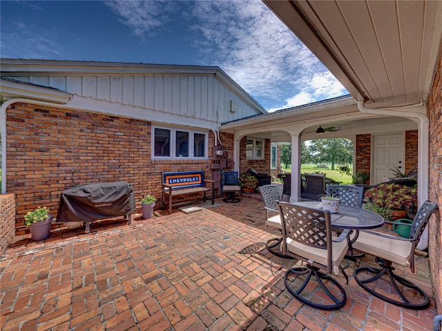 view of patio / terrace featuring ceiling fan and area for grilling