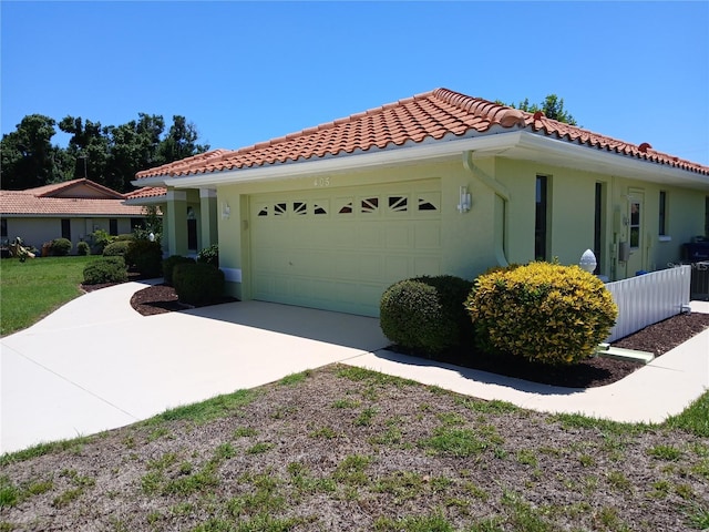 view of side of property featuring a garage