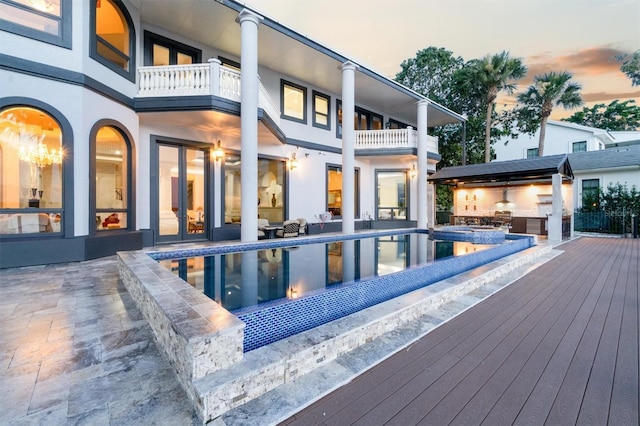 outdoor pool featuring a patio area