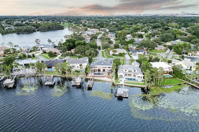 aerial view with a water view and a residential view