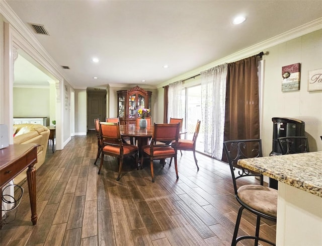 dining room with crown molding