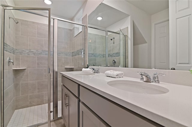 bathroom with vanity and an enclosed shower