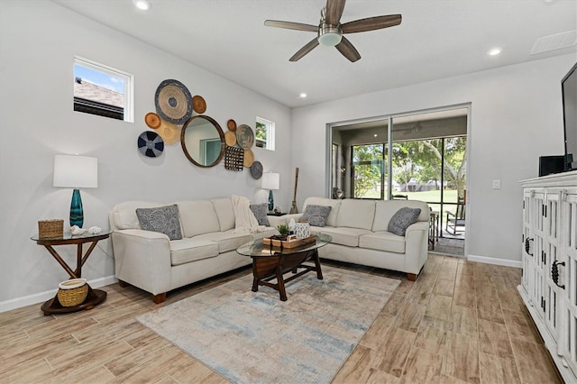 living room featuring ceiling fan