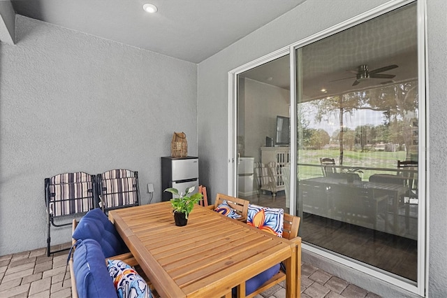 dining space featuring ceiling fan