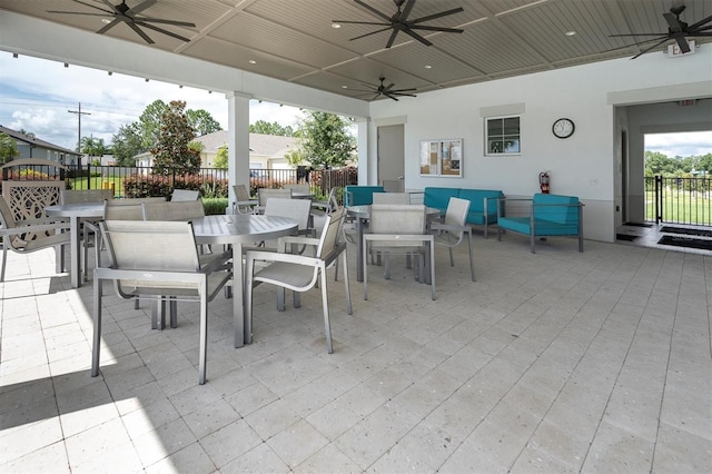 view of patio with ceiling fan