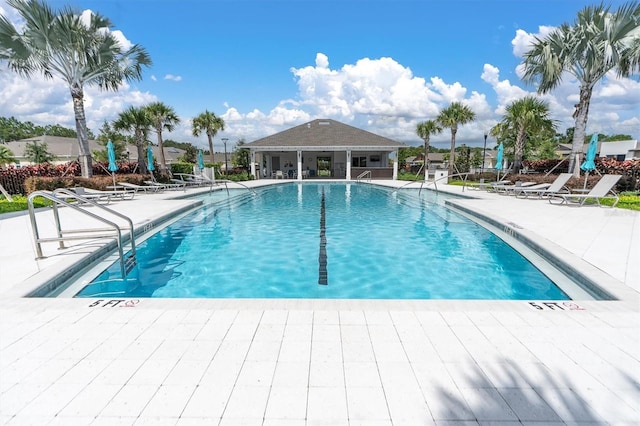 view of pool featuring a patio