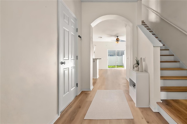 hall with light hardwood / wood-style flooring