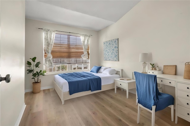 bedroom featuring light wood-type flooring