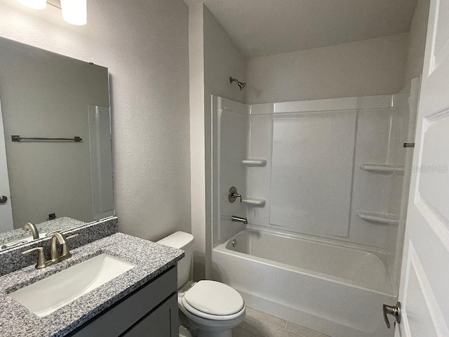 full bathroom with shower / tub combination, vanity, and toilet