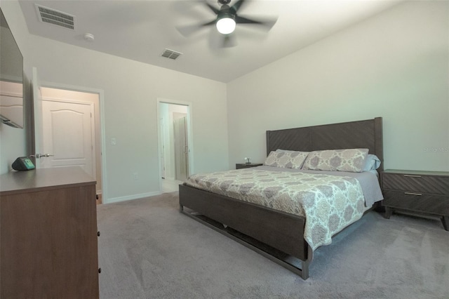 bedroom with ceiling fan and light colored carpet