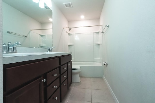 full bathroom featuring toilet, vanity, tile patterned floors, and shower / tub combination